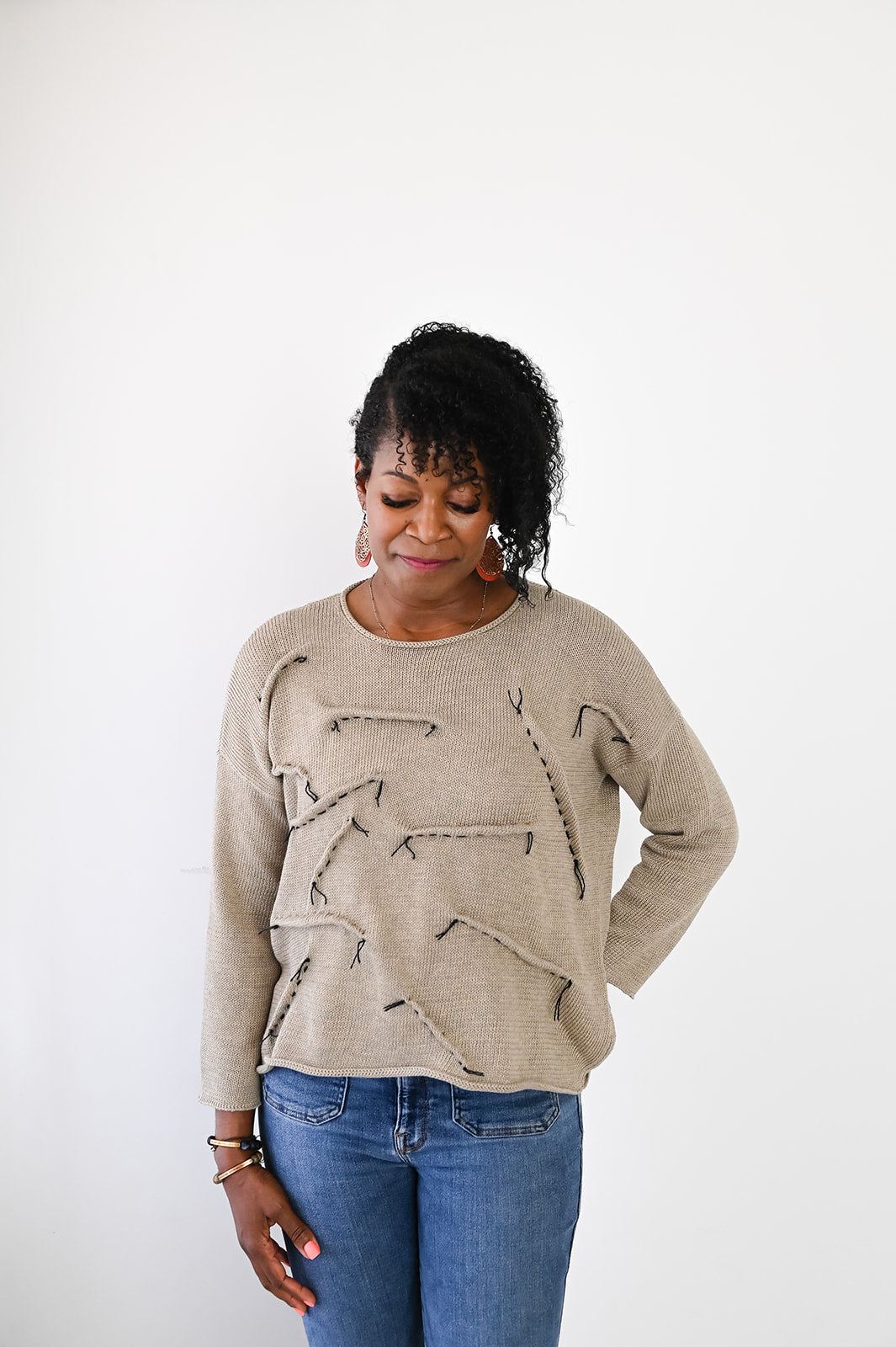 Sweater with tucks